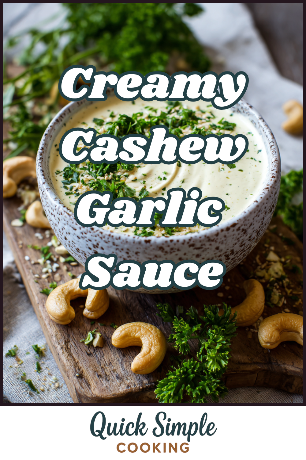 A bowl of Creamy Cashew Garlic Sauce garnished with chopped herbs, surrounded by raw cashews and fresh parsley on a wooden board.