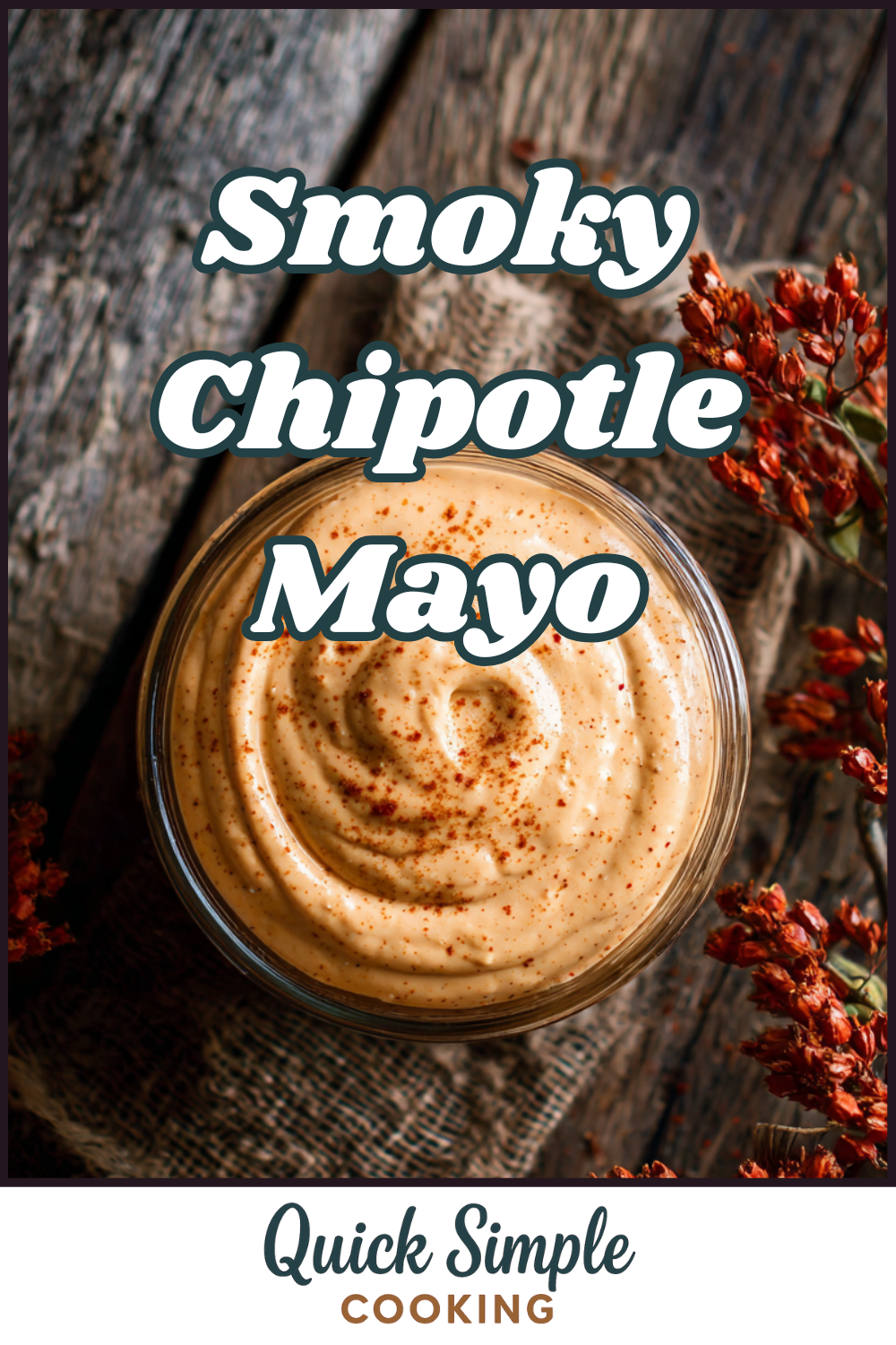 A bowl of creamy chipotle mayo garnished with spices sits on a rustic wooden surface beside dried flowers. Text overlay reads "Smoky Chipotle Mayo Recipe.