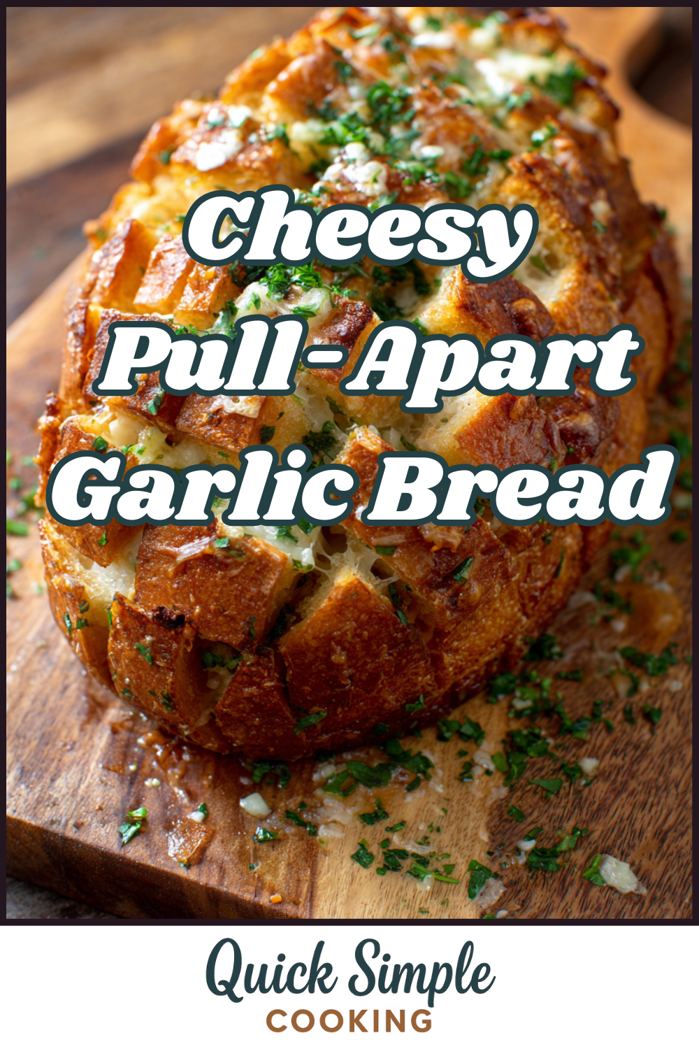 A loaf of cheesy pull-apart garlic bread topped with chopped herbs on a wooden board. Text reads: "Cheesy Pull-Apart Garlic Bread – the ultimate quick, simple cooking treat.